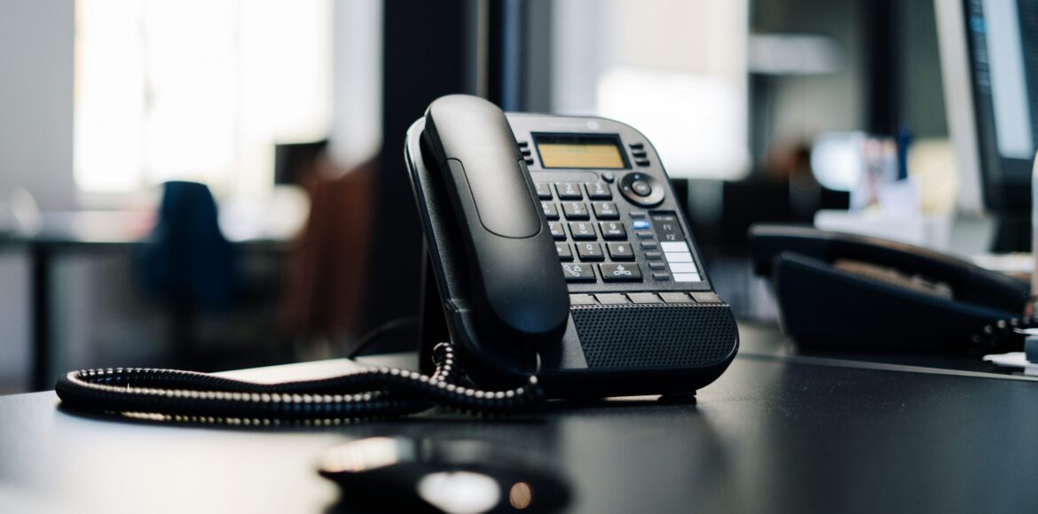 AI receptionist answering phone in office